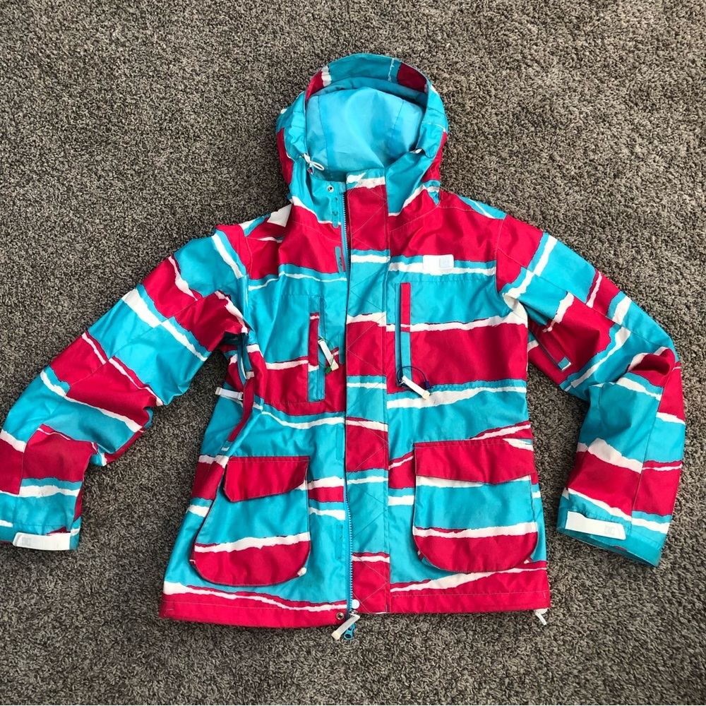DC snow Jacket. It was used for snowboarding and skiing. In good condition.